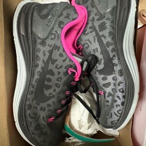 Nike Women's Charcoal Gray Running Shoes with Bright Pink Lining